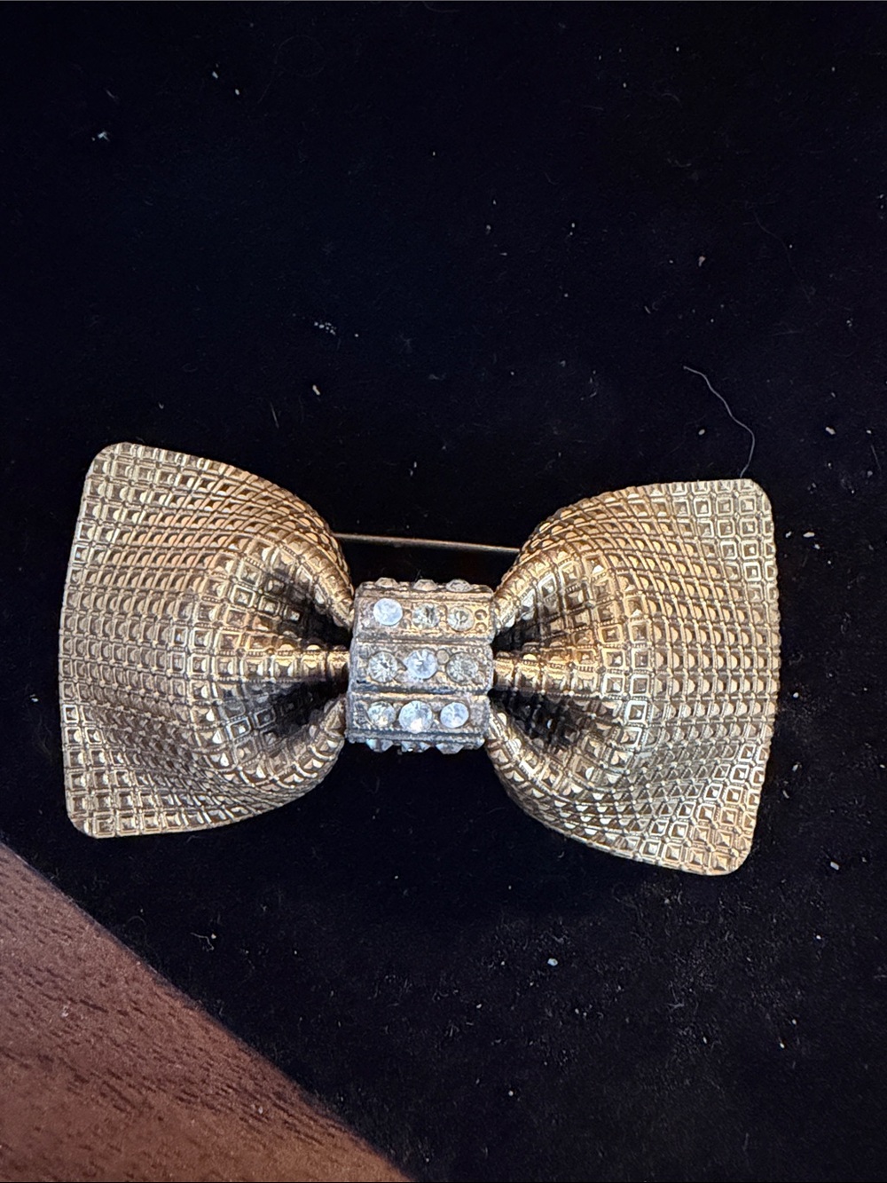 Gold Textured Bow Brooch with Rhinestone Center